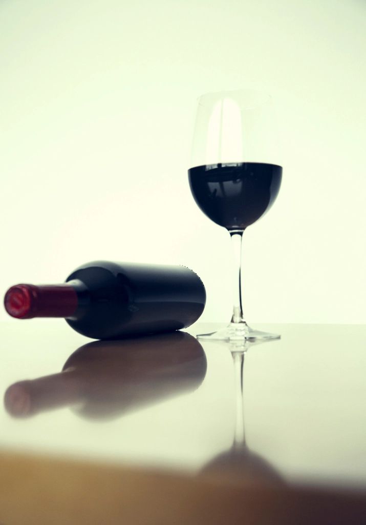 Wine glasses and bottles on the counter