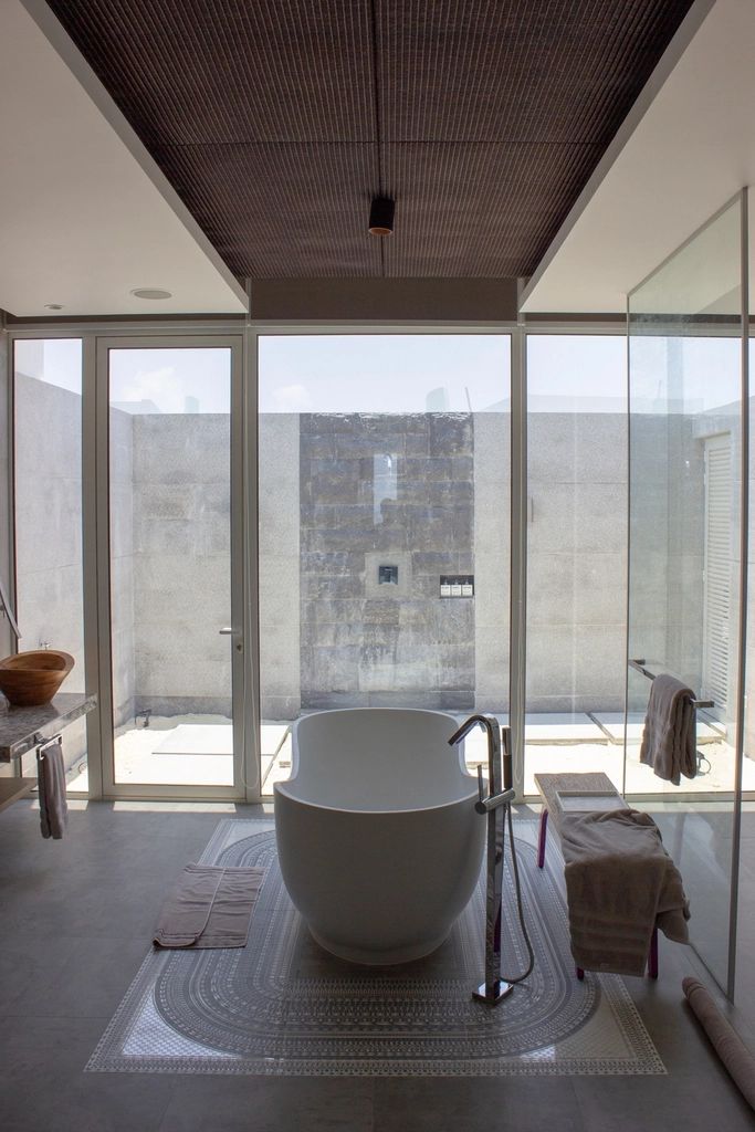 The sauna and steam room, lined in timber